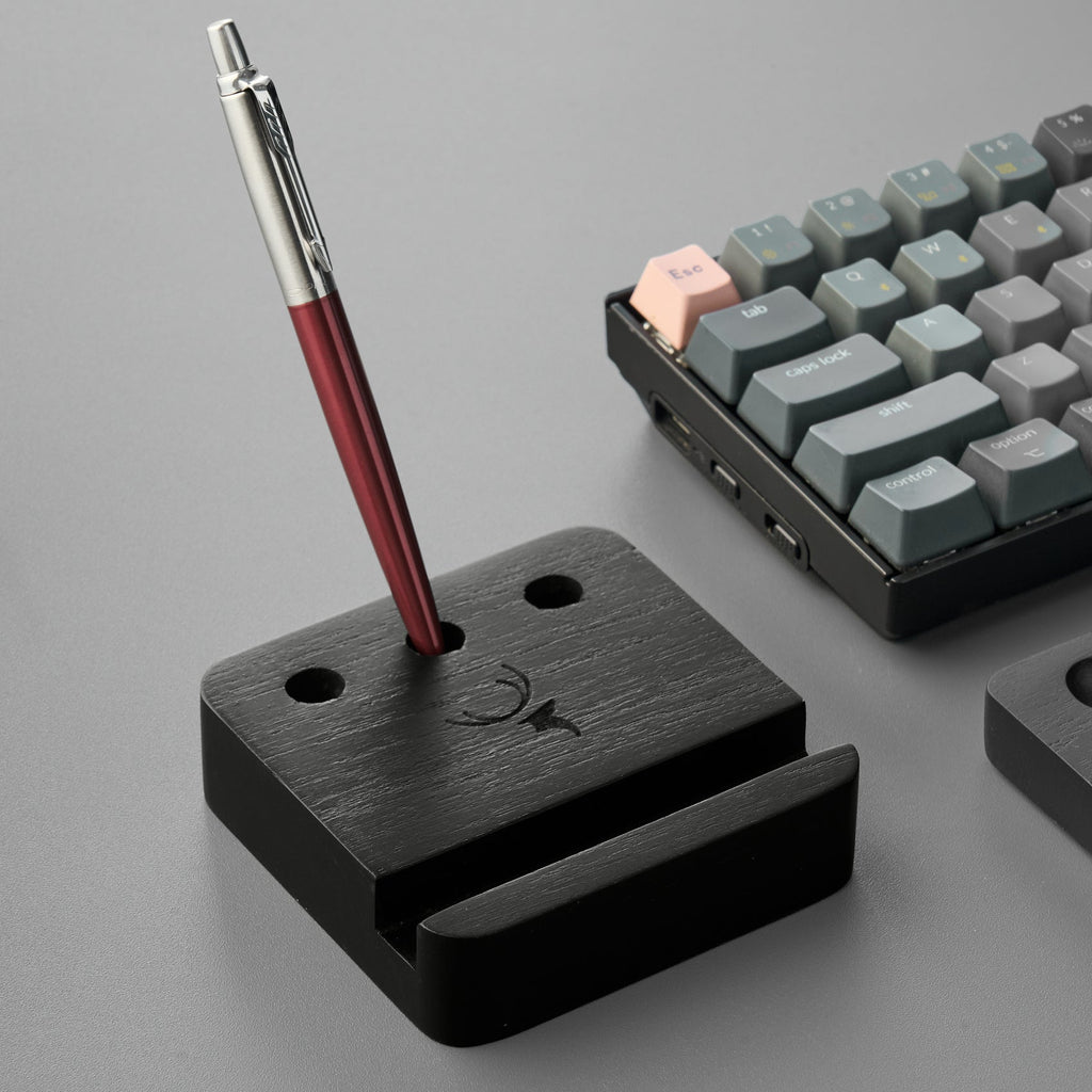 Black Pen and Phone Stand