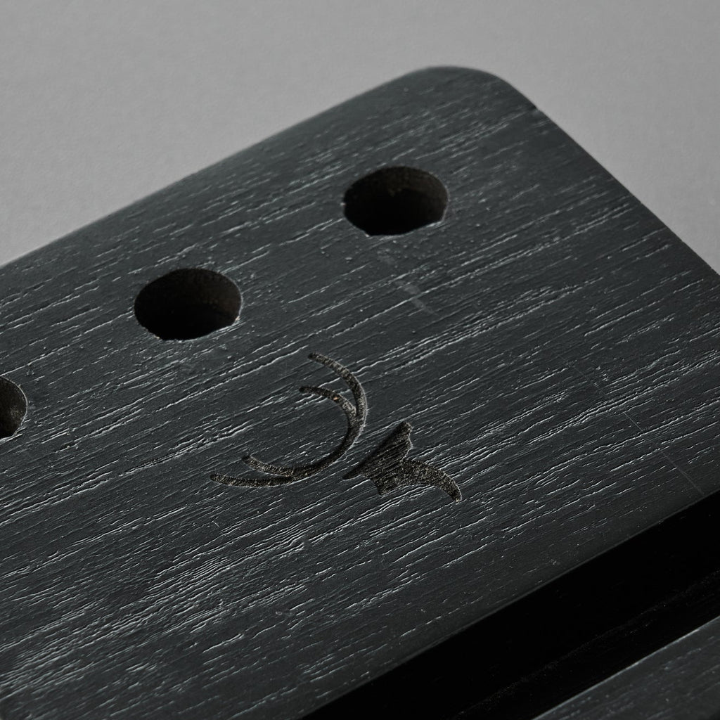Black Pen and Phone Stand