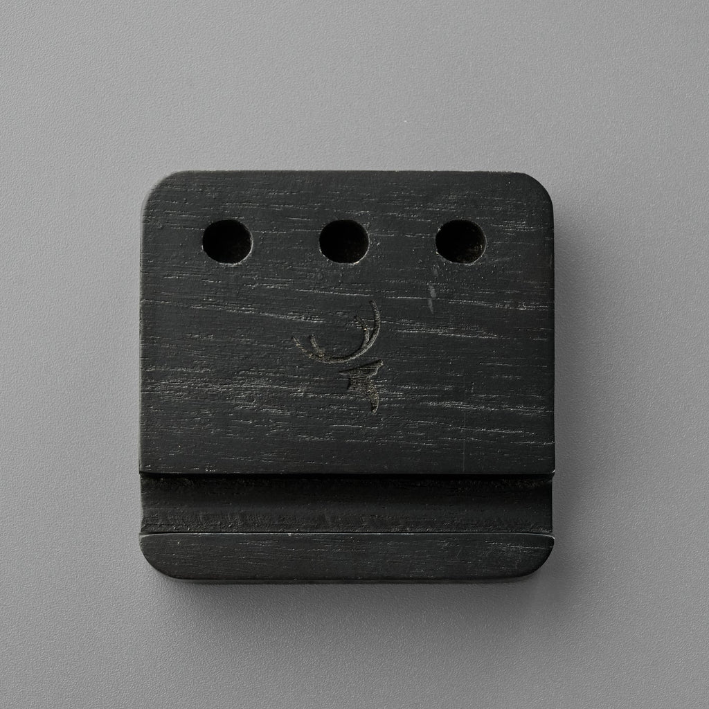 Black Pen and Phone Stand